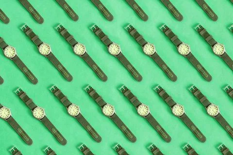 Top view of pattern Men's accessories with green sports watches Stock Photos