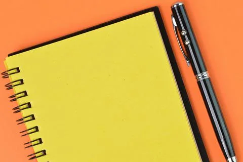 Top view of pen and notebook with copy space. Business concept. Stock Photos