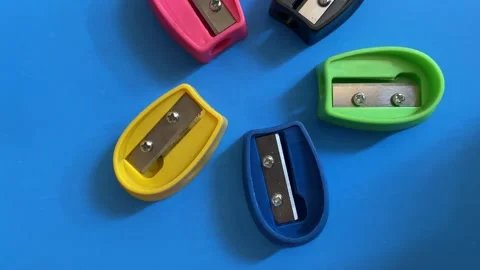 Top View of Pencil Sharpners and Razor Stock Footage 293950732
