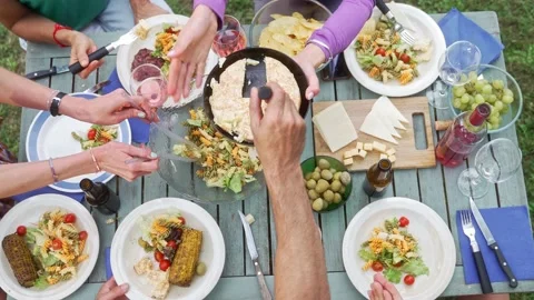 Top View Of People Hands Sharing healthy food, vegetarian organic pasta salad Stock Footage 198475399
