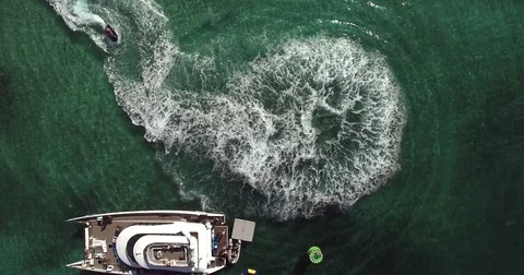Top View of People Having Fun on Jetski and Yacht Stock Footage 73428600
