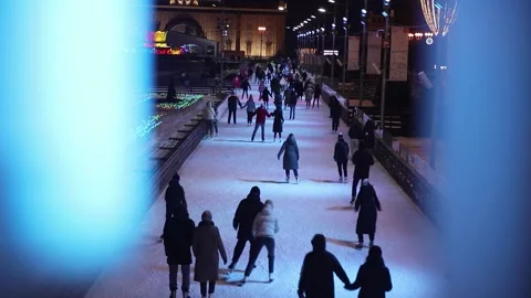 Top view of people skating on an open skating rink Stock Footage 146238616