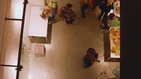 Top view of people walking and making pictures during exhibition Stock Footage 83056293