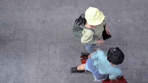 top view of people walking with holding ... | Stock Video | Pond5