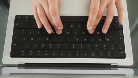 Top view of person hands typing on keyboard. Business woman emailing to client Stock Footage 228925706