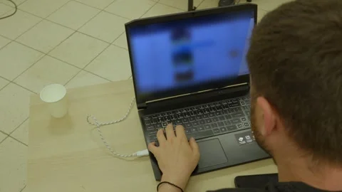 Top View of Person Using Laptop in Modern Office Stock Footage 341765893