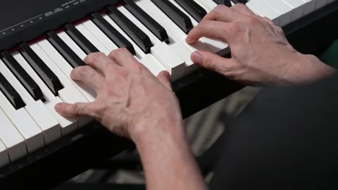 Top view of pianist playing Stock Footage 147692969