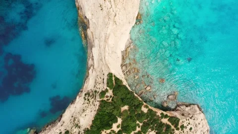 Top view of picturesque rock cliffs and vibrant blue sea. Stock Footage 156628832