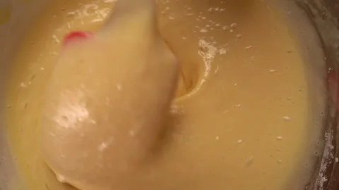 Top view. Pie dough is mixed with silicone spatula. Process of making homem.. Stock Footage 338396981