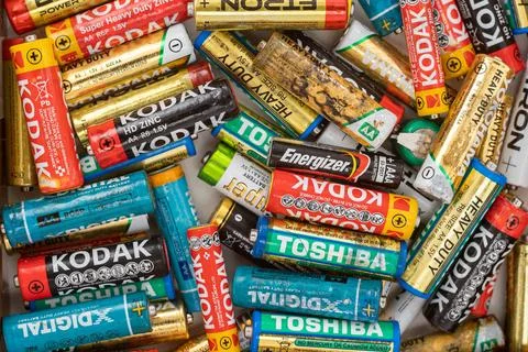 Top view of a pile of AA and AAA batteries that are used and will be recycled.  Stock Photos
