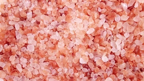 Top view of pink Himalayan salt crystals circle rotation close up Stock Footage 233996880