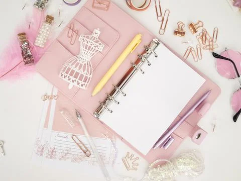 Top view of a pink planner with cute stationery. Pink glamour planner with a 스톡 일러스트