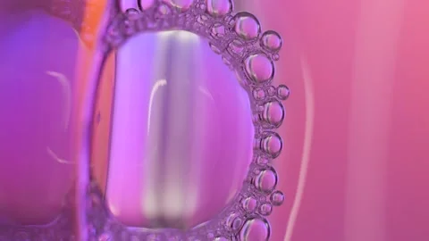 Top view pink soap bubbles floating on the water Stock Footage 256731453