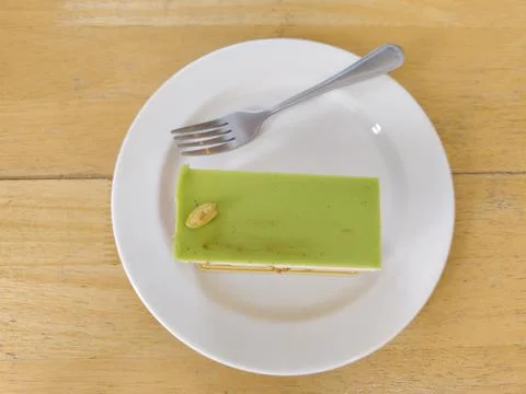 Top view pitachio cake on dish. Stock Photos