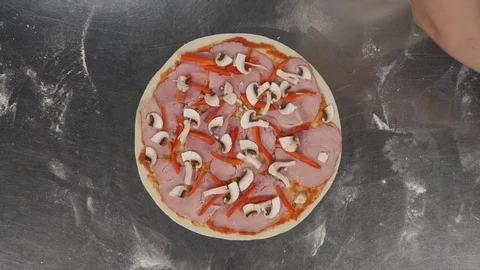 Top view of the pizza chef cooking at professional kitchen. Professional Stock Footage 121411587