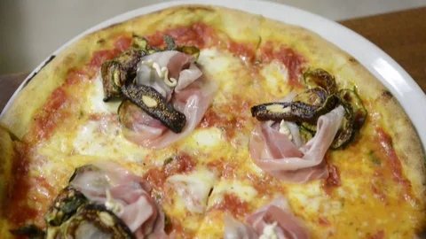 Top view pizza with ham and zucchini Stock Footage 72616733