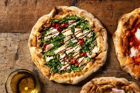 Top view of pizza with rocket Stock Photos