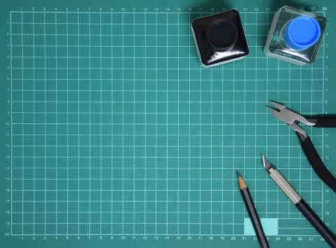 Top view Plastic model tool kit ink, art knife, cutting pliers on Cutting mat Stock Photos
