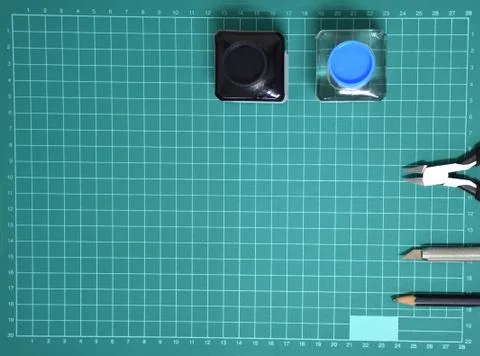 Top view Plastic model tool kit ink, art knife, cutting pliers on Cutting mat Stock Photos