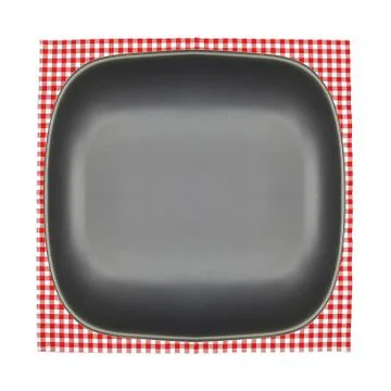 Top view plate on checkered tablecloth pattern background 库存照片