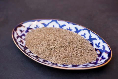Top view of plate with cumin Stock Photos
