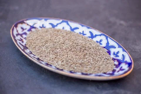 Top view of plate with cumin Stock Photos