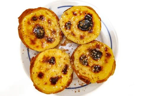 Top view of plate with pasteis de nata Stock Photos