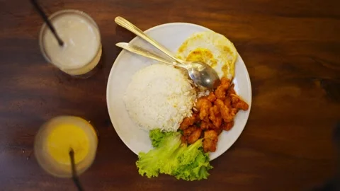 Top View of Plate with Rice and Egg Stock Footage 344236024