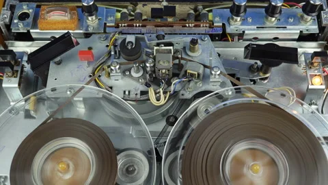 Top View Playing an Old Mechanical Reel-to-Reel Tape Recorder. Stock-Footage 227173576