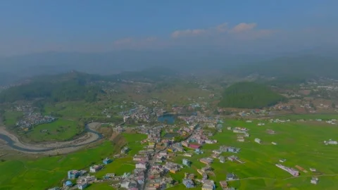 Top view of Pond and small city in mountain uttrakhand Stock Footage 305540467