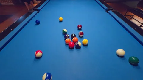 Top View Of Pool Table With Racked Balls And Woman Aiming Cue Ball For Break Sho Stock Footage 326914692