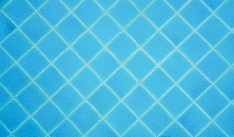 Top view of pool wall tiled with blue ceramic background Stock Photos
