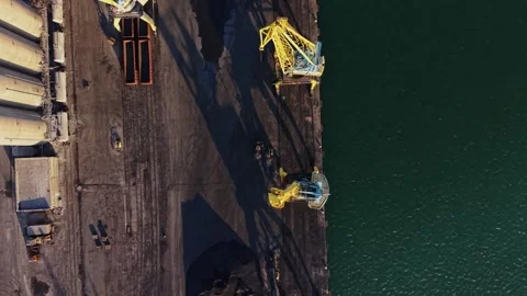 Top view of port crane and coal pile Stock Footage 338186229