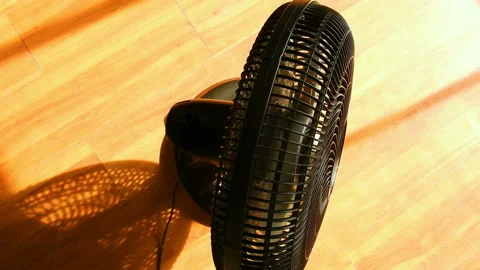 Top view of a portable table fan in rotating operation Stock Footage 144907234