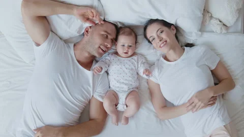 Top view portrait of loving and joyful young caucasian parents, mother, father Video stock 168242953
