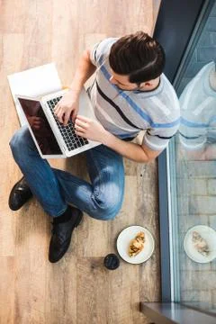 Top view of a positive nice man working Stockfoto's