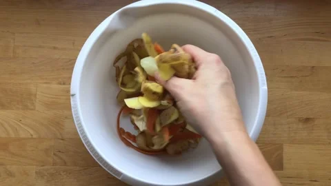 Top view of potato,carrot peeling garbage. Food compost, circular economy Stock Footage 228434321