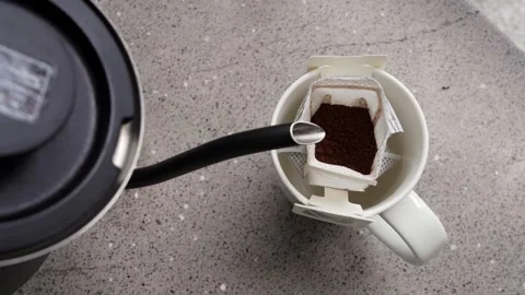 Top View Pour Over Coffee Brewing Into Mug With Drip Filter 스톡 동영상 333690545