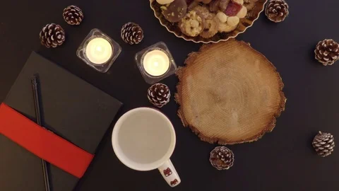 Top view pouring freshly brewed coffee to a Christmas cup on the table Stock Footage 70012997