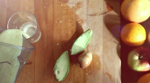 Top view of pouring fruit smoothie into glass Stock Footage 59541073