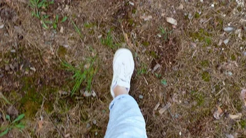 Top view POV of female feet in white sne... | Stock Video | Pond5