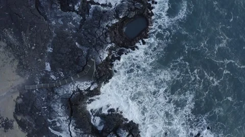 Top view of powerful sea waves rolling and splashing in slow motion ne Stock Footage 256956628