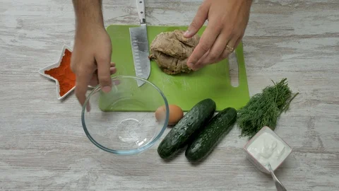 Top view of prepearing meat dish with eggs and vegitables Stock Footage 94160274