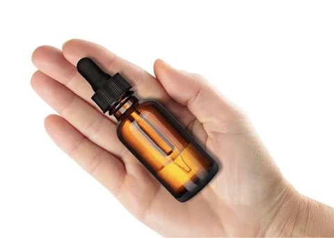 Top View Presentation of Classic Dropper Bottle in Hand Foto stock