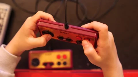 Top view pressing joystick buttons eight-bit 8 bit video console, Stock Footage 270155901