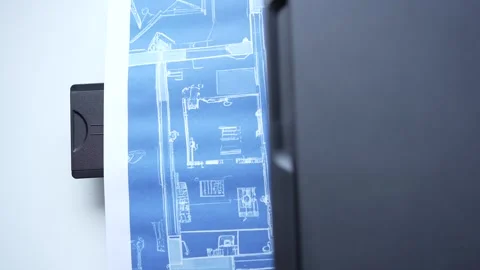 Top View Printer Printing Blue Print Plans of a House Closeup Stock Footage 243326969