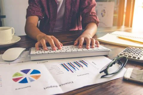 Top view process close-up analyzing investment chart working in office. Busin Stock Photos