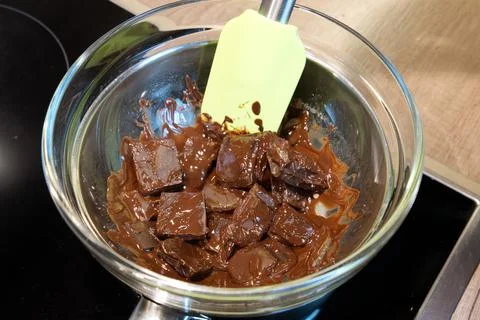 Top View of the process of melting chocolate. Ingredients for cooking chocolate Stock Photos