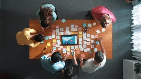 Top view of programmer brainstorming and planning about web design. Symposium. Stock Footage 270430926