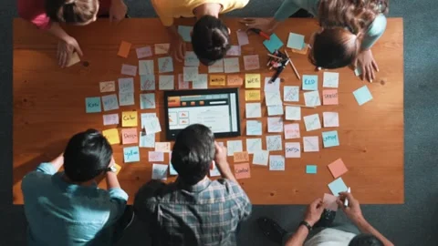 Top view of programmer brainstorming and planning about web design. Symposium. Stock Footage 271374007